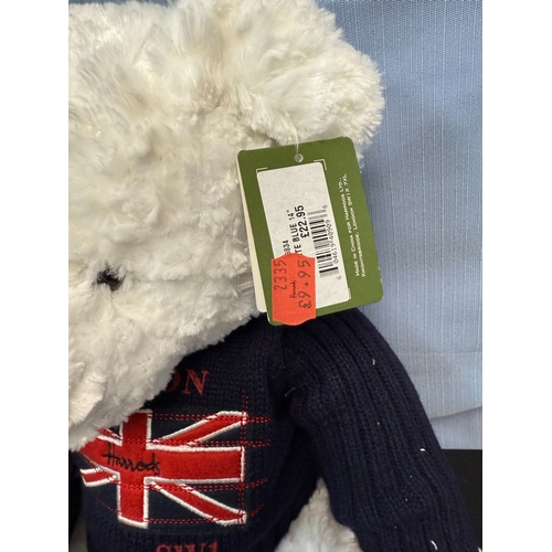 677 - Official Land Rover Promotional Safari Bear together with a Steiff Christmas Bear and a Harrods Bear