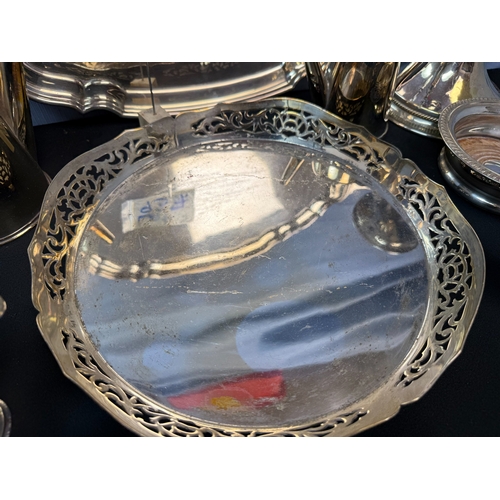 937 - A Large Lot of Silver Plate Items to include Wine Coasters, Candlesticks, Tray etc