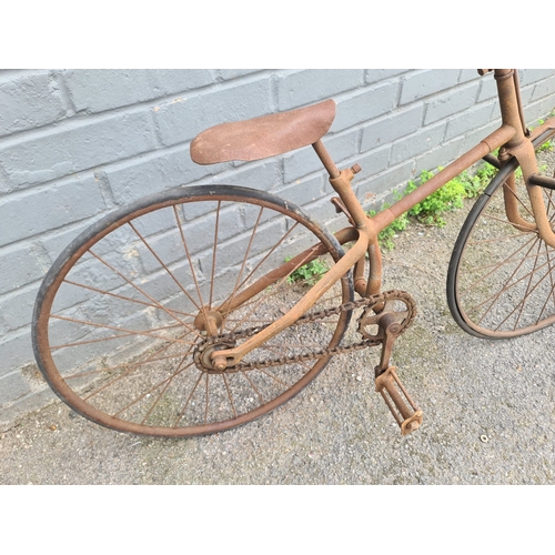 1B - An Antique French Juvenile Cross Frame Bicycle. Solid Tyres, Wheel Size 10 Inch