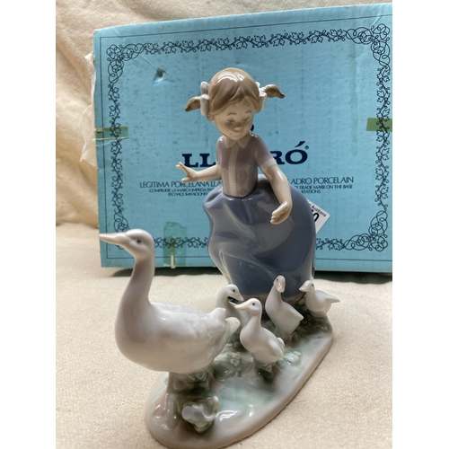 350 - Mint and Boxed Lladro Hurry Now Figurine