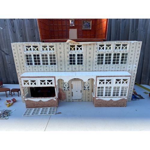 637B - A Good Quality Dolls House and Collection of Furniture