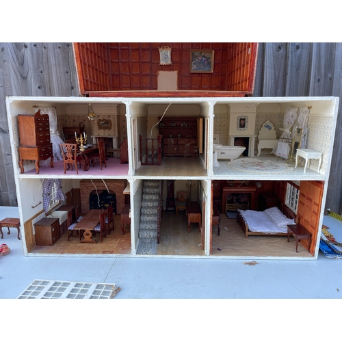 637B - A Good Quality Dolls House and Collection of Furniture