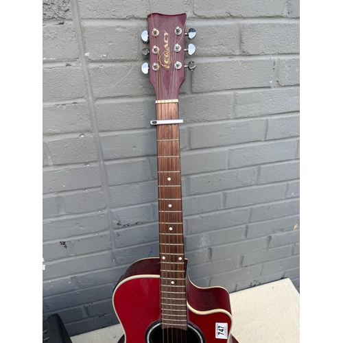 747 - Legacy Acoustic Guitar with Pickup together with a Vox Amplifier