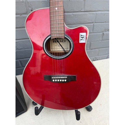 747 - Legacy Acoustic Guitar with Pickup together with a Vox Amplifier