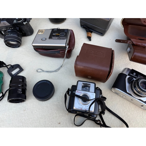 835 - A Good Lot of Vintage Cameras incl. Canon AE-1