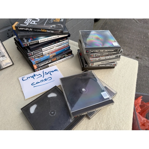 838 - A Large Retro Gaming Lot including PS1/PS2 Games and Accessories plus a large quantity of empty case... 