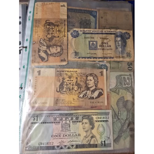 10A - 2x albums containing a large qty of vintage world banknotes