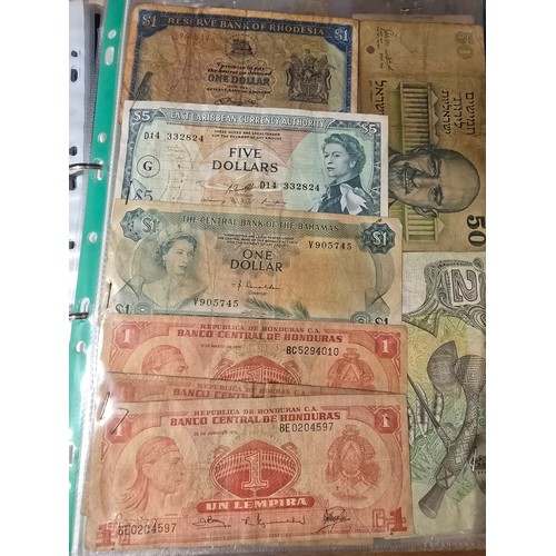 10A - 2x albums containing a large qty of vintage world banknotes