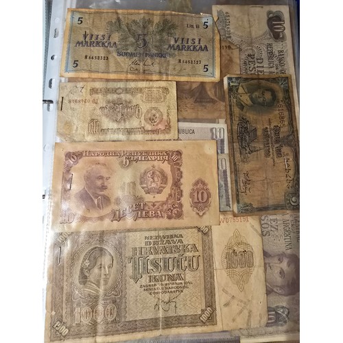 10A - 2x albums containing a large qty of vintage world banknotes