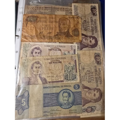 10A - 2x albums containing a large qty of vintage world banknotes