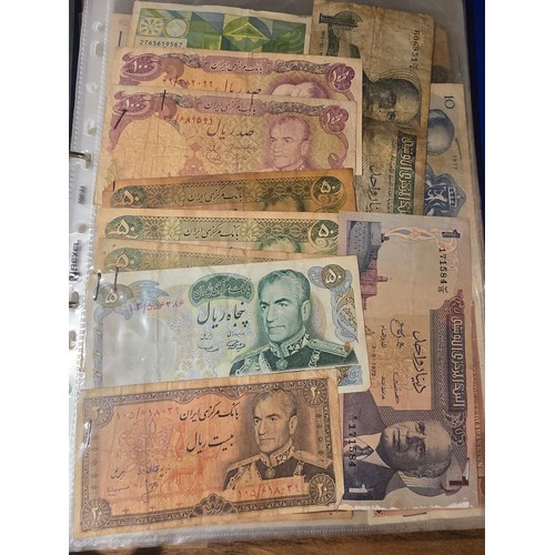 10A - 2x albums containing a large qty of vintage world banknotes