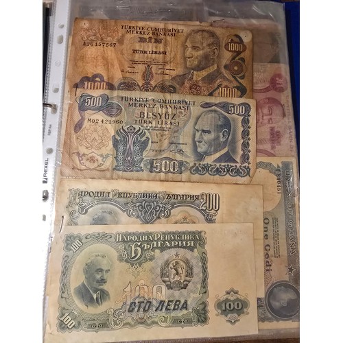 10A - 2x albums containing a large qty of vintage world banknotes