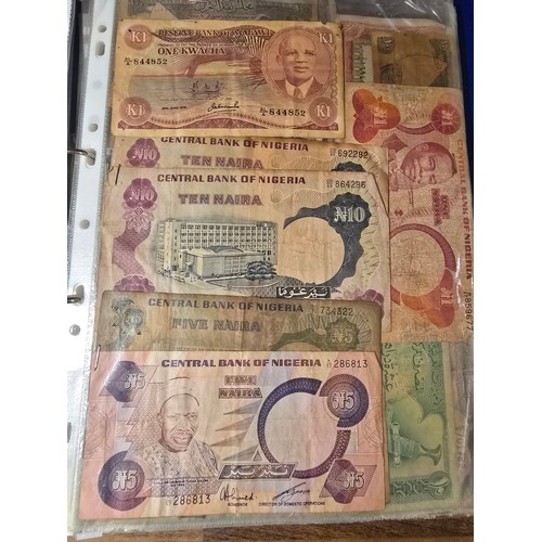 10A - 2x albums containing a large qty of vintage world banknotes