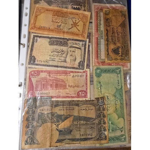 10A - 2x albums containing a large qty of vintage world banknotes