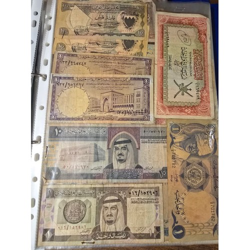 10A - 2x albums containing a large qty of vintage world banknotes