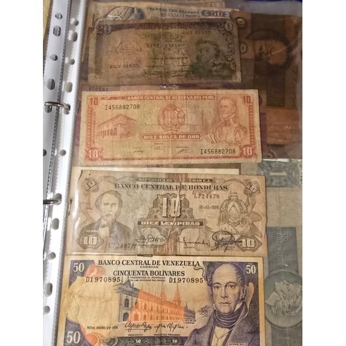 10A - 2x albums containing a large qty of vintage world banknotes