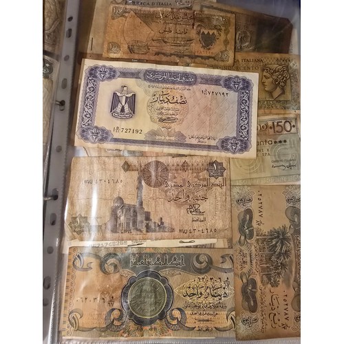 10A - 2x albums containing a large qty of vintage world banknotes