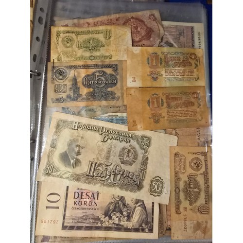 10A - 2x albums containing a large qty of vintage world banknotes