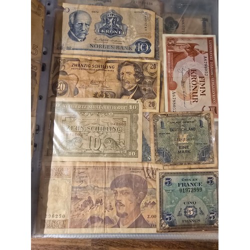 10A - 2x albums containing a large qty of vintage world banknotes