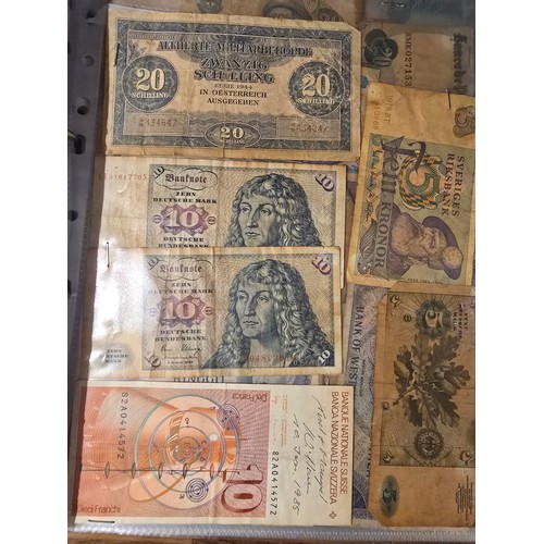 10A - 2x albums containing a large qty of vintage world banknotes