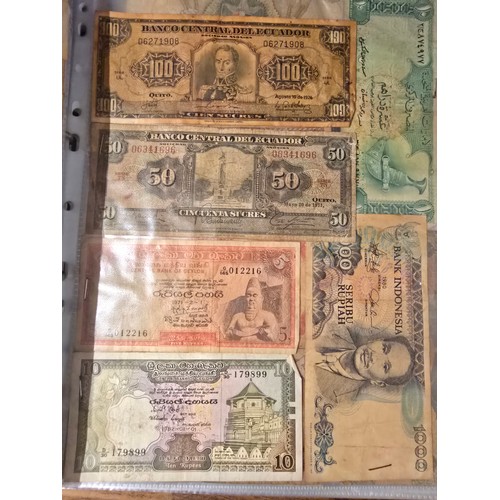 10A - 2x albums containing a large qty of vintage world banknotes