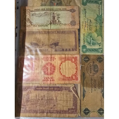 10A - 2x albums containing a large qty of vintage world banknotes