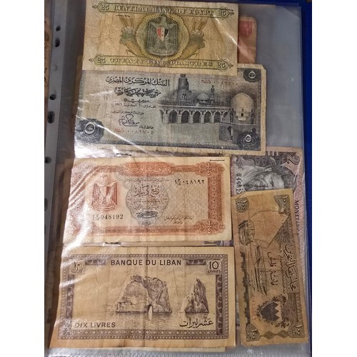 10A - 2x albums containing a large qty of vintage world banknotes