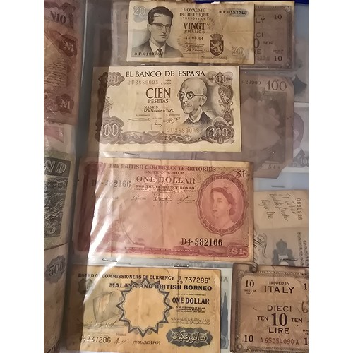 10A - 2x albums containing a large qty of vintage world banknotes