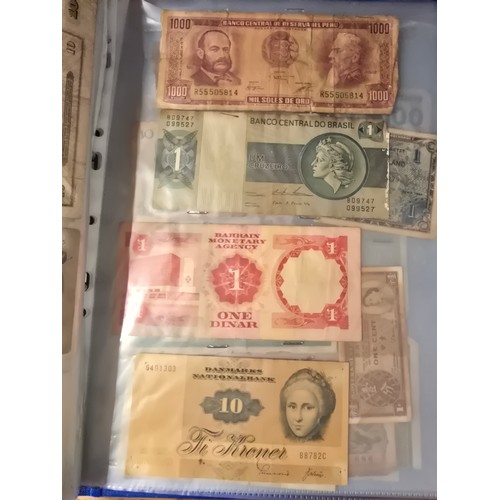 10A - 2x albums containing a large qty of vintage world banknotes