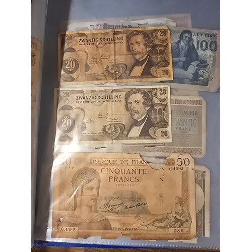 10A - 2x albums containing a large qty of vintage world banknotes