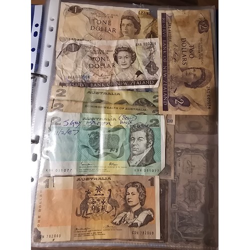 10A - 2x albums containing a large qty of vintage world banknotes