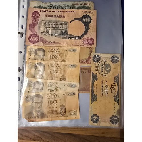 10A - 2x albums containing a large qty of vintage world banknotes