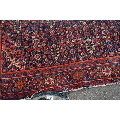 1D - A Persian Sarouk Rug with Herati Design to to central pale blue medallion and indigo field. The main... 