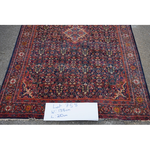 1D - A Persian Sarouk Rug with Herati Design to to central pale blue medallion and indigo field. The main... 