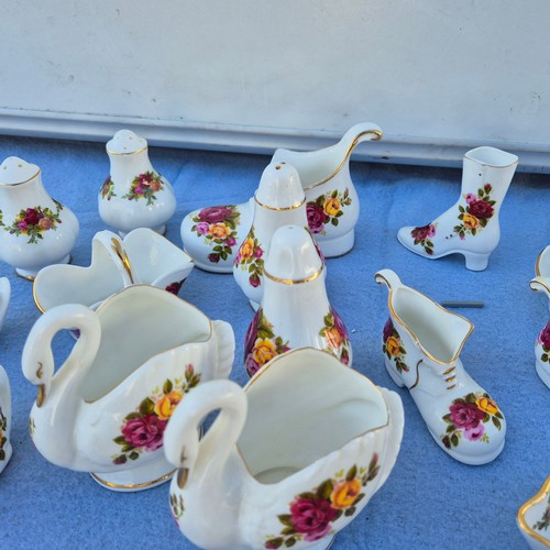 777 - Large Collection of “Cottage Rose” in the style of Royal Albert