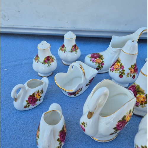 777 - Large Collection of “Cottage Rose” in the style of Royal Albert