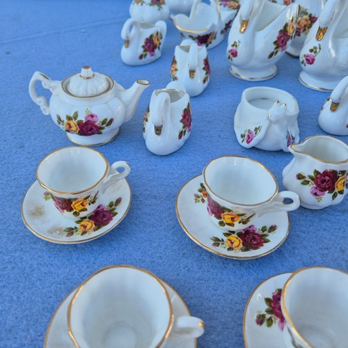 777 - Large Collection of “Cottage Rose” in the style of Royal Albert