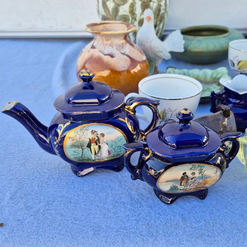 779 - Mixed lot to include Ridgway Coclough Cups & Saucers, a Lladro Nao Figure, a Royal Dux Bird & a Capo... 