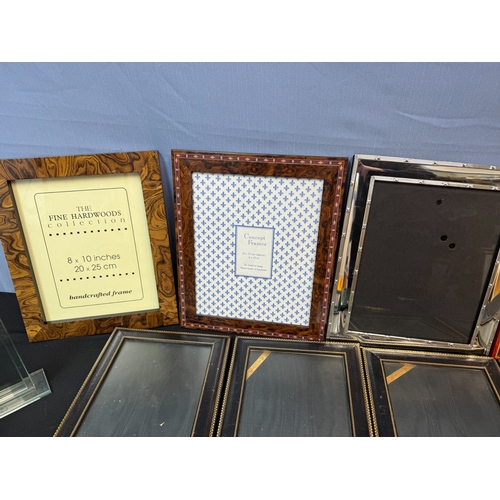 65 - Shelf of Very Good Quality Photo Frames including an example with 22ct Gold Enamel, Dorvilliers of P... 