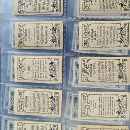 201C - An Album of Complete Cigarette Card Sets to include Stamps, Rugby and Football Themed Sets