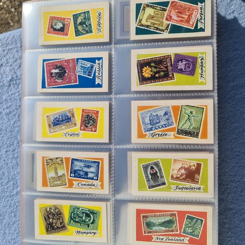 201C - An Album of Complete Cigarette Card Sets to include Stamps, Rugby and Football Themed Sets