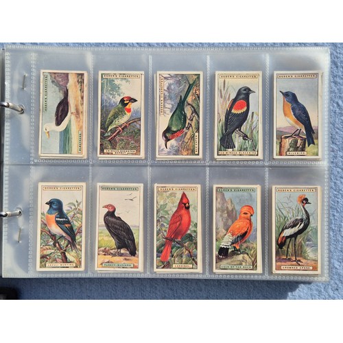 201D - Two Albums Containing Various Complete Cigarette Card Sets