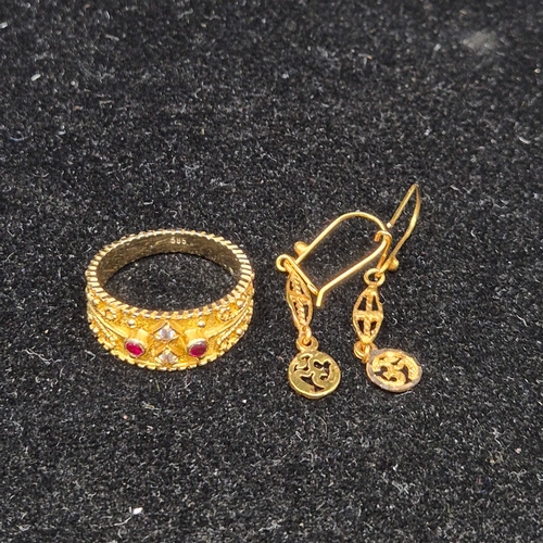 27 - Indian Gold Jewellery: A 14ct Ring Size Q (4.42g) and a pair of Yellow Metal Earrings (tested 10ct) ... 