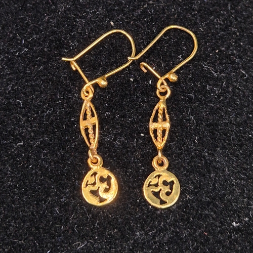 27 - Indian Gold Jewellery: A 14ct Ring Size Q (4.42g) and a pair of Yellow Metal Earrings (tested 10ct) ... 