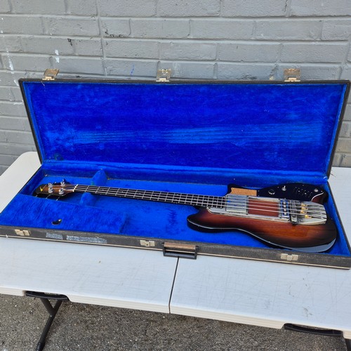 28 - An Ovation Magnum Bass Guitar in Case