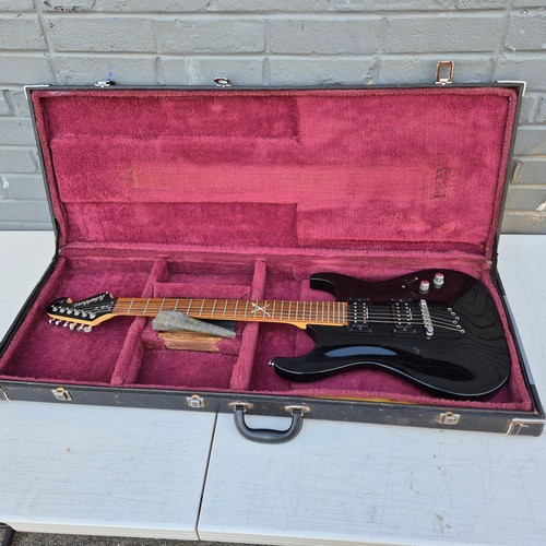 29 - A Washburn X30 Electric Guitar in Case