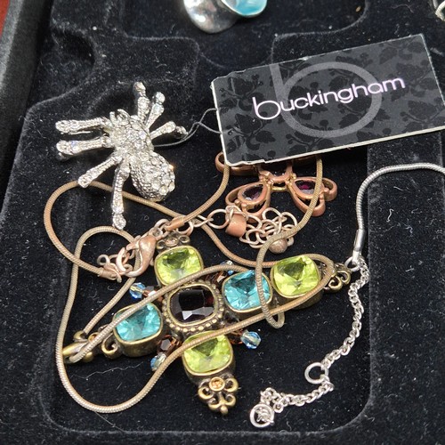 48 - A Mixed Lot of interesting Jewellery to include Brooches, Earrings, Necklaces etc in a Wooden Box