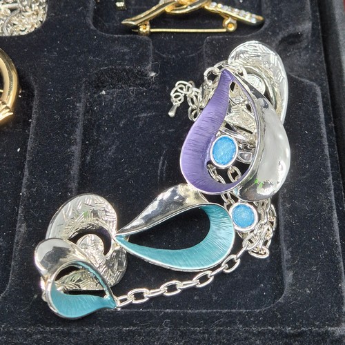 48 - A Mixed Lot of interesting Jewellery to include Brooches, Earrings, Necklaces etc in a Wooden Box