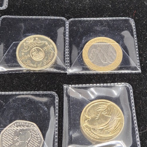 43 - A Collection of Twelve UK Commemorative Coins to include £5 coins, £2 coins etc