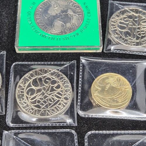 43 - A Collection of Twelve UK Commemorative Coins to include £5 coins, £2 coins etc